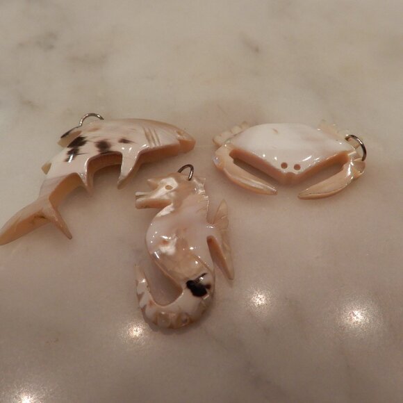 Hand Carved Shell Sea Creature Pendants - Picture 1 of 4